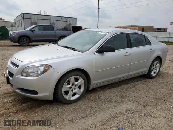 ✅ 2011 Chevrolet Malibu 1LS • VIN: 1G1ZB5E14BF326151 • Lot: 67765654. Listed on Copart with 144,910 mi. Free auction sales archive from the USA and detailed vehicle history report at DreamBid. Image 1.