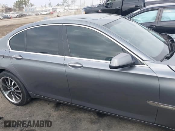 ✅ 2012 BMW 7 Series 740i • VIN: WBAKA4C52CC613676 • Lot: 42509312. Listed on IAAI with 113,971 mi. Free auction sales archive from the USA and detailed vehicle history report at DreamBid. Image 13.