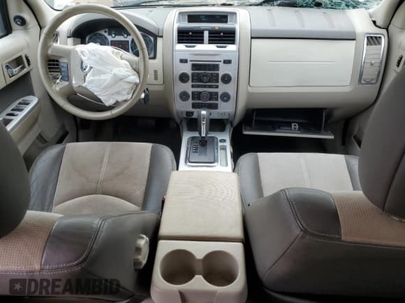 ✅ 2010 Mercury Mariner Premier • VIN: 4M2CN8HG2AKJ03385 • Lot: 66471005. Listed on Copart with 141,423 mi. Free auction sales archive from the USA and detailed vehicle history report at DreamBid. Image 8.