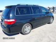 ✅ 2007 Honda Odyssey EX-L • VIN: 5FNRL38627B032873 • Лот: 43610953. Опубликован ранее на IAAI с пробегом 81 611 миль. Бесплатный доступ к архиву аукционных продаж из США и подробный отчёт об истории автомобиля на DreamBid. Изображение 4.