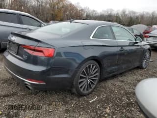 ✅ 2018 Audi A5 Prestige • VIN: WAURNAF54JA008645 • Лот: 93342045. Опубликован ранее на Copart с пробегом 73 582 миль. Бесплатный доступ к архиву аукционных продаж из США и подробный отчёт об истории автомобиля на DreamBid. Изображение 3.