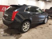 ✅ 2015 Cadillac SRX Premium Collection • VIN: 3GYFNGE30FS607373 • Lot: 42868728. Wystawiony na IAAI z przebiegiem 109 910 mil. Bezpłatny archiwum sprzedaży aukcyjnych z USA i szczegółowy raport historii pojazdu na DreamBid. Zdjęcie 4.