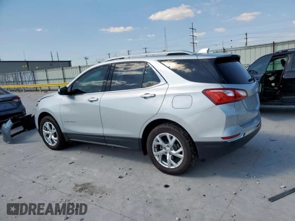 ✅ 2020 Chevrolet Equinox Premier • VIN: 2GNAXNEV4L6163187 • Lot: 81802995. Wystawiony na Copart z przebiegiem 57 892 mil. Bezpłatny archiwum sprzedaży aukcyjnych z USA i szczegółowy raport historii pojazdu na DreamBid. Zdjęcie 2.