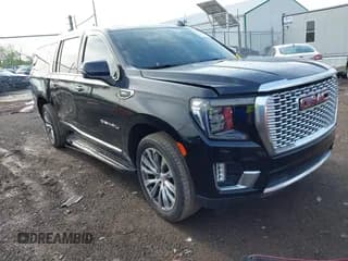 ✅ 2021 GMC Yukon XL Denali • VIN: 1GKS2JKL2MR416881 • Lot: 42165694. Listed on IAAI with 84,102 mi. Free auction sales archive from the USA and detailed vehicle history report at DreamBid. Image 1.