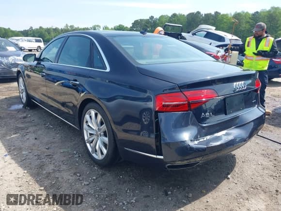 ✅ 2016 Audi A8 3.0T • VIN: WAU34AFD7GN001464 • Лот: 42102275. Опубликован ранее на IAAI с пробегом 107 398 миль. Бесплатный доступ к архиву аукционных продаж из США и подробный отчёт об истории автомобиля на DreamBid. Изображение 3.