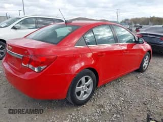 ✅ 2015 Chevrolet Cruze LT • VIN: 1G1PC5SB5F7142533 • Lot: 43564069. Listed on IAAI with 133,279 mi. Free auction sales archive from the USA and detailed vehicle history report at DreamBid. Image 4.