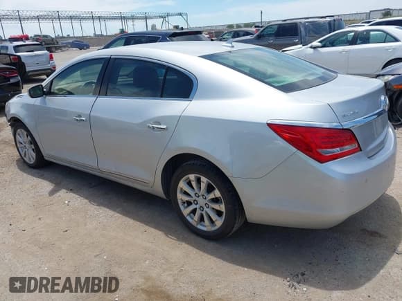 ✅ 2014 Buick LaCrosse Leather • VIN: 1G4GB5GR6EF244567 • Лот: 42314562. Опубликован ранее на IAAI с пробегом 184 472 миль. Бесплатный доступ к архиву аукционных продаж из США и подробный отчёт об истории автомобиля на DreamBid. Изображение 3.