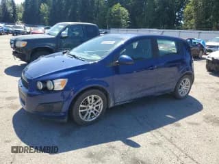 ✅ 2013 Chevrolet Sonic LS • VIN: 1G1JA6SH5D4199903 • Lot: 68561405. Listed on Copart with 115,397 mi. Free auction sales archive from the USA and detailed vehicle history report at DreamBid. Image 1.
