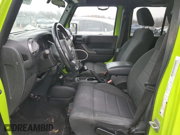 ✅ 2012 Jeep Wrangler Unlimited Sport • VIN: 1C4BJWDGXCL269562 • Lot: 93205885. Listed on Copart with 169,231 mi. Free auction sales archive from the USA and detailed vehicle history report at DreamBid. Image 7.