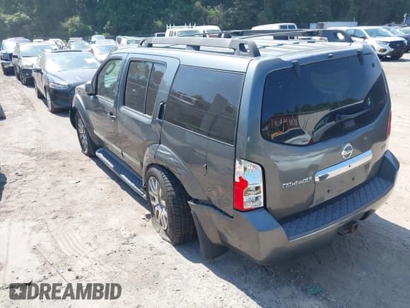 ✅ 2009 Nissan Pathfinder SE • VIN: 5N1AR18B39C615574 • Lot: 42802230. Listed on IAAI with 119,025 mi. Free auction sales archive from the USA and detailed vehicle history report at DreamBid. Image 3.