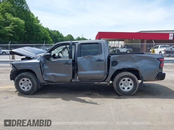 ✅ 2022 Nissan Frontier SV • VIN: 1N6ED1EK9NN633002 • Lot: 42298704. Listed on IAAI with 47,800 mi. Free auction sales archive from the USA and detailed vehicle history report at DreamBid. Image 13.