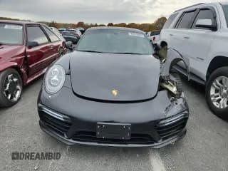 ✅ 2017 Porsche 911 Turbo S • VIN: WP0AD2A95HS167360 • Lot: 86816865. Wystawiony na Copart z przebiegiem 18 478 mil. Bezpłatny archiwum sprzedaży aukcyjnych z USA i szczegółowy raport historii pojazdu na DreamBid. Zdjęcie 5.