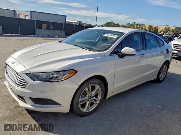 ✅ 2018 Ford Fusion SE • VIN: 3FA6P0H77JR113510 • Лот: 94438405. Опубликован ранее на Copart с пробегом 125 494 миль. Бесплатный доступ к архиву аукционных продаж из США и подробный отчёт об истории автомобиля на DreamBid. Изображение 1.
