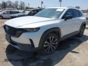 ✅ 2023 Mazda CX-50 Premium • VIN: 7MMVABDY5PN107511 • Lot: 41323099. Listed on IAAI with 52,059 mi. Free auction sales archive from the USA and detailed vehicle history report at DreamBid. Image 2.