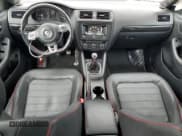 ✅ 2014 Volkswagen Jetta GLI • VIN: 3VW5T7AJ2EM326204 • Lot: 85565075. Listed on Copart with 41,851 mi. Free auction sales archive from the USA and detailed vehicle history report at DreamBid. Image 8.