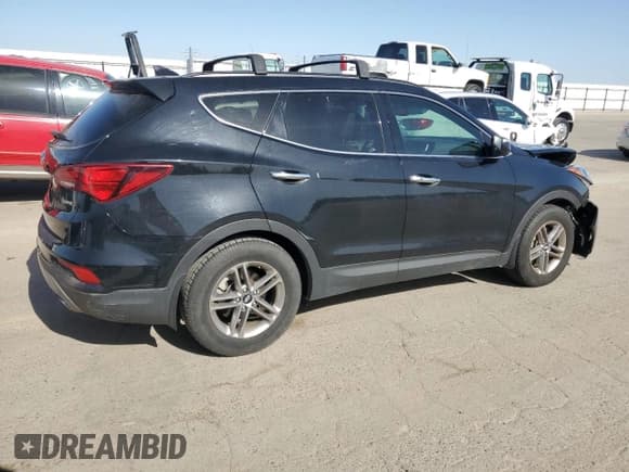 ✅ 2018 Hyundai Santa Fe 2.4L • VIN: 5XYZU3LB6JG518457 • Лот: 53483464. Опубликован ранее на Copart с пробегом 62 274 миль. Бесплатный доступ к архиву аукционных продаж из США и подробный отчёт об истории автомобиля на DreamBid. Изображение 3.