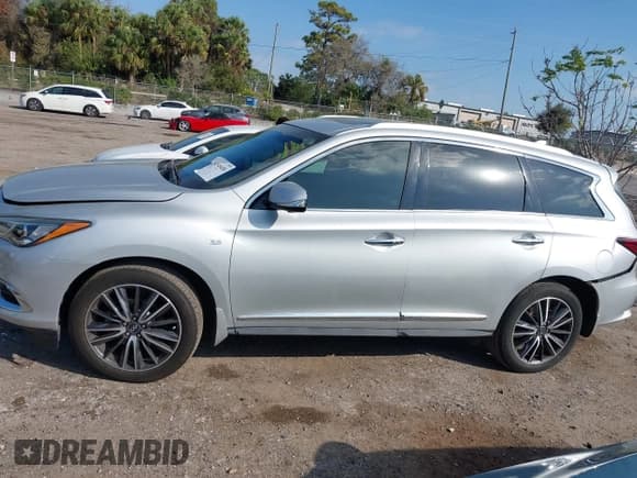 ✅ 2020 Infiniti QX60 Luxe • VIN: 5N1DL0MN9LC535891 • Lot: 41549458. Listed on IAAI with 39,409 mi. Free auction sales archive from the USA and detailed vehicle history report at DreamBid. Image 14.