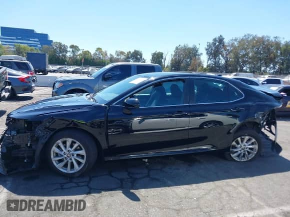 2022 Toyota Camry LE с VIN 4T1C11AK1NU668224, выставлен на аукционе IAAI как лот 43141098 с пробегом 52 675 миль миль и . История ставок и продаж доступна на DreamBid. Изображение 15.