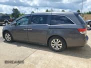 ✅ 2014 Honda Odyssey EX-L • VIN: 5FNRL5H65EB040989 • Lot: 60655755. Listed on Copart with 224,963 mi. Free auction sales archive from the USA and detailed vehicle history report at DreamBid. Image 2.