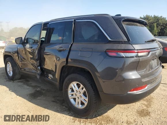 ✅ 2023 Jeep Grand Cherokee Laredo • VIN: 1C4RJHAG9PC621664 • Lot: 67230305. Listed on Copart with 33,975 mi. Free auction sales archive from the USA and detailed vehicle history report at DreamBid. Image 2.