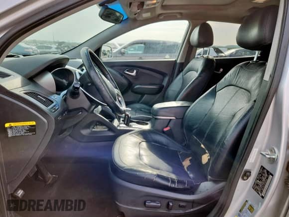 2013 Hyundai Tucson GLS with VIN KM8JU3AC7DU566198, listed as a Copart auction lot 71479605 with 196,474 mi miles and Salvage title. Bid and sale history available at DreamBid. Image 7.