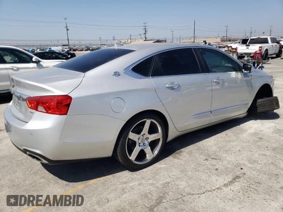 ✅ 2014 Chevrolet Impala LTZ • VIN: 1G1155S39EU106210 • Лот: 69523014. Опубликован ранее на Copart с пробегом 129 446 миль. Бесплатный доступ к архиву аукционных продаж из США и подробный отчёт об истории автомобиля на DreamBid. Изображение 3.
