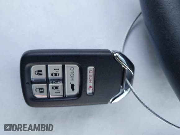 ✅ 2015 Honda Odyssey Touring Elite • VIN: 5FNRL5H96FB060244 • Lot: 43701520. Listed on IAAI with 185,250 mi. Free auction sales archive from the USA and detailed vehicle history report at DreamBid. Image 11.