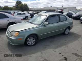 2003 Hyundai Accent GL with VIN KMHCG35C13U277732, listed as a Copart auction lot 72276634 with 135,176 mi miles and Salvage title. Bid and sale history available at DreamBid. Image 1.