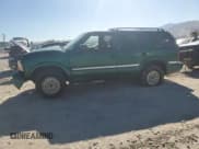 ✅ 2000 GMC Jimmy SLE Convenience • VIN: 1GKDT13W3Y2215035 • Lot: 77484104. Listed on Copart with 116,124 mi. Free auction sales archive from the USA and detailed vehicle history report at DreamBid. Image 1.