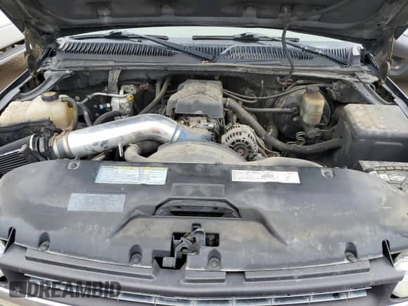 2000 Chevrolet Silverado 1500 LT z VIN 2GCEK19T3Y1154611, wystawiony jako Copart lot #66749694 z przebiegiem 186 003 mil mil oraz Szkoda całkowita • Salvage title. Historia ofert i sprzedaży dostępna na DreamBid. Obrazek 11.