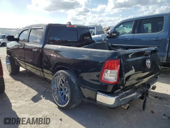 2023 Ram 1500 Lone Star with VIN 1C6RREMT8PN565793, listed as a Copart auction lot 77084184 with 18,825 mi miles and Salvage title. Bid and sale history available at DreamBid. Image 2.