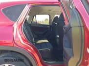 ✅ 2014 Mazda CX-5 Touring • VIN: JM3KE2CY9E0366805 • Lot: 43557677. Wystawiony na IAAI z przebiegiem 210 857 mil. Bezpłatny archiwum sprzedaży aukcyjnych z USA i szczegółowy raport historii pojazdu na DreamBid. Zdjęcie 8.