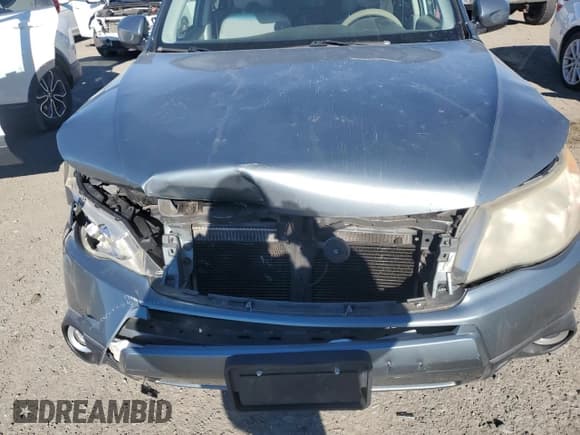 ✅ 2013 Subaru Forester X Premium • VIN: JF2SHADC8DH437121 • Lot: 92782775. Listed on Copart with 179,057 mi. Free auction sales archive from the USA and detailed vehicle history report at DreamBid. Image 12.