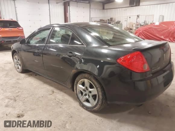 ✅ 2009 Pontiac G6 1SA • VIN: 1G2ZG57B994171248 • Lot: 42335463. Listed on IAAI with 169,611 mi. Free auction sales archive from the USA and detailed vehicle history report at DreamBid. Image 3.