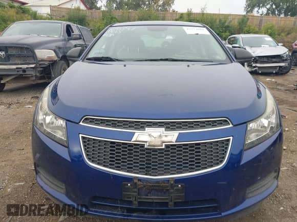 2013 Chevrolet Cruze LS z VIN 1G1PA5SH8D7148947, wystawiony jako IAAI lot #43274804 z przebiegiem 96 207 mil mil oraz . Historia ofert i sprzedaży dostępna na DreamBid. Obrazek 12.