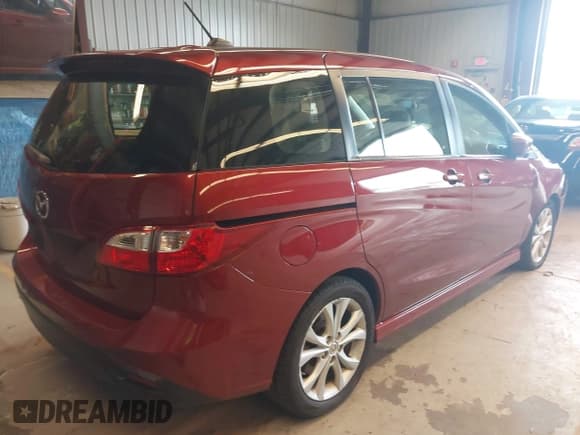 ✅ 2012 Mazda 5 Touring • VIN: JM1CW2CL3C0136544 • Lot: 42696240. Listed on IAAI with 77,400 mi. Free auction sales archive from the USA and detailed vehicle history report at DreamBid. Image 4.