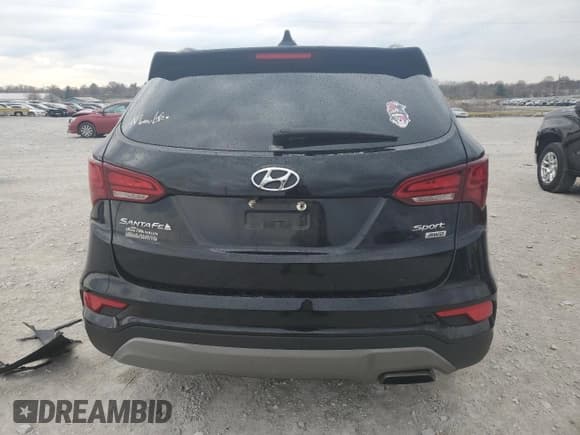 ✅ 2018 Hyundai Santa Fe 2.4L • VIN: 5XYZUDLB4JG563810 • Лот: 77243283. Опубликован ранее на Copart с пробегом 70 150 миль. Бесплатный доступ к архиву аукционных продаж из США и подробный отчёт об истории автомобиля на DreamBid. Изображение 6.
