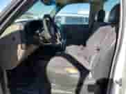 2004 Chevrolet Silverado 1500 Work Truck z VIN 1GCEK14V84Z189042, wystawiony jako Copart lot #81054544 z przebiegiem 149 878 mil mil oraz Szkoda całkowita • Salvage title. Historia ofert i sprzedaży dostępna na DreamBid. Obrazek 7.