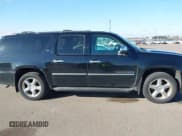 ✅ 2014 Chevrolet Suburban LTZ • VIN: 1GNSKKE74ER169548 • Lot: 43560269. Listed on IAAI with 255,008 mi. Free auction sales archive from the USA and detailed vehicle history report at DreamBid. Image 13.