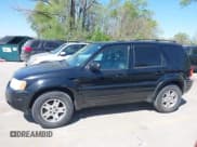 ✅ 2003 Ford Escape Limited • VIN: 1FMCU94103KB90251 • Lot: 42034006. Listed on IAAI with 225,566 mi. Free auction sales archive from the USA and detailed vehicle history report at DreamBid. Image 14.