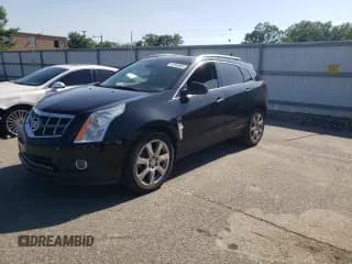 ✅ 2011 Cadillac SRX Premium Collection • VIN: 3GYFNFEYXBS547540 • Lot: 62563895. Listed on Copart with 107,136 mi. Free auction sales archive from the USA and detailed vehicle history report at DreamBid. Image 1.