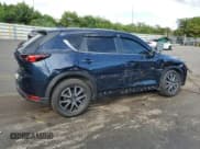 ✅ 2018 Mazda CX-5 Touring • VIN: JM3KFACM6J1448886 • Lot: 91935085. Wystawiony na Copart z przebiegiem 102 177 mil. Bezpłatny archiwum sprzedaży aukcyjnych z USA i szczegółowy raport historii pojazdu na DreamBid. Zdjęcie 3.
