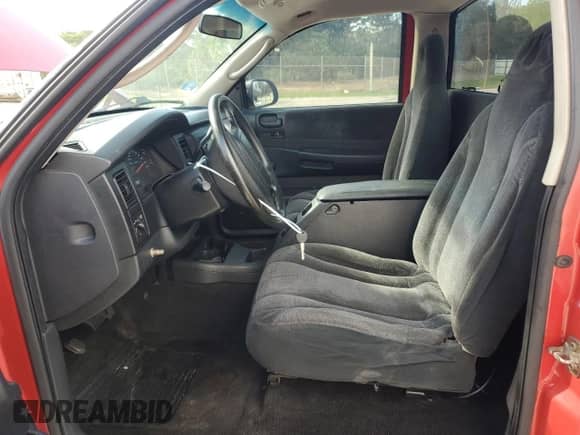 2002 Dodge Dakota Sport z VIN 1B7FL36X72S543943, wystawiony jako Copart lot #80767984 z przebiegiem Nie podano mil oraz Czysty tytuł • Clean title. Historia ofert i sprzedaży dostępna na DreamBid. Obrazek 7.