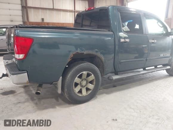✅ 2005 Nissan Titan LE • VIN: 1N6AA07B55N500154 • Lot: 42455068. Listed on IAAI with 147,180 mi. Free auction sales archive from the USA and detailed vehicle history report at DreamBid. Image 13.