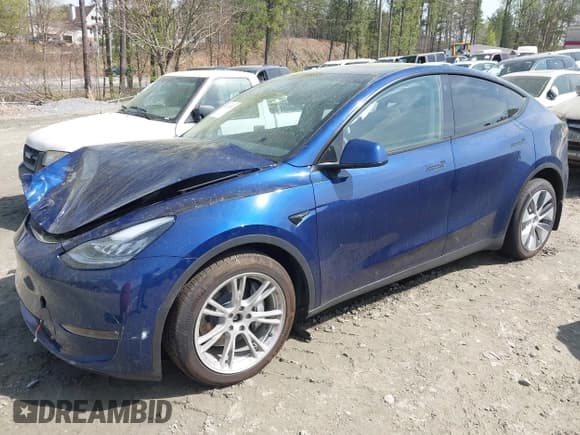 ✅ 2023 Tesla Model Y Long Range • VIN: 7SAYGDEE3PA033533 • Lot: 41933287. Listed on IAAI with 35,364 mi. Free auction sales archive from the USA and detailed vehicle history report at DreamBid. Image 17.