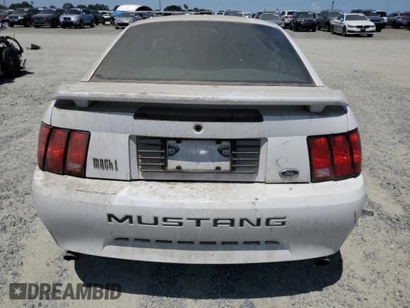 ✅ 2004 Ford Mustang Standard • VIN: 1FAFP40624F164974 • Lot: 57714955. Listed on Copart with Not provided. Free auction sales archive from the USA and detailed vehicle history report at DreamBid. Image 6.