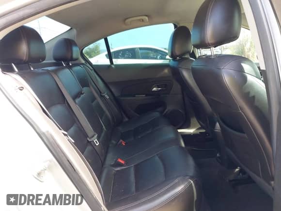 2013 Chevrolet Cruze LTZ z VIN 1G1PG5SBXD7201836, wystawiony jako IAAI lot #43507702 z przebiegiem Nie podano mil oraz . Historia ofert i sprzedaży dostępna na DreamBid. Obrazek 8.