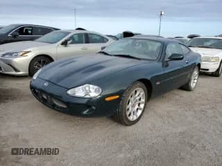 ✅ 2000 Jaguar XK • VIN: SAJJA41BXYPA10261 • Лот: 75336884. Опубликован ранее на Copart с пробегом Не указан. Бесплатный доступ к архиву аукционных продаж из США и подробный отчёт об истории автомобиля на DreamBid. Изображение 1.