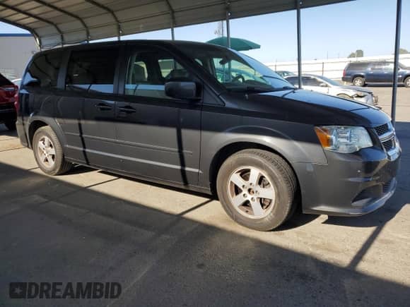 2012 Dodge Grand Caravan SXT z VIN 2C4RDGCG0CR195282, wystawiony jako Copart lot #63917785 z przebiegiem 162 243 mil mil oraz Szkoda całkowita • Salvage title. Historia ofert i sprzedaży dostępna na DreamBid. Obrazek 4.