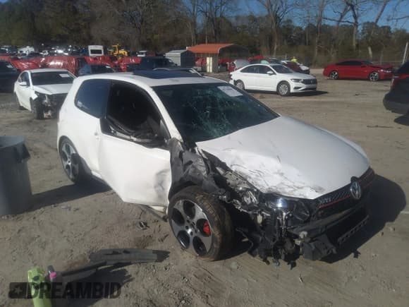 ✅ 2012 Volkswagen Golf GTI w/Conv & Sunroof • VIN: WVWEV7AJ5CW094384 • Lot: 41744860. Listed on IAAI with 157,285 mi. Free auction sales archive from the USA and detailed vehicle history report at DreamBid. Image 1.